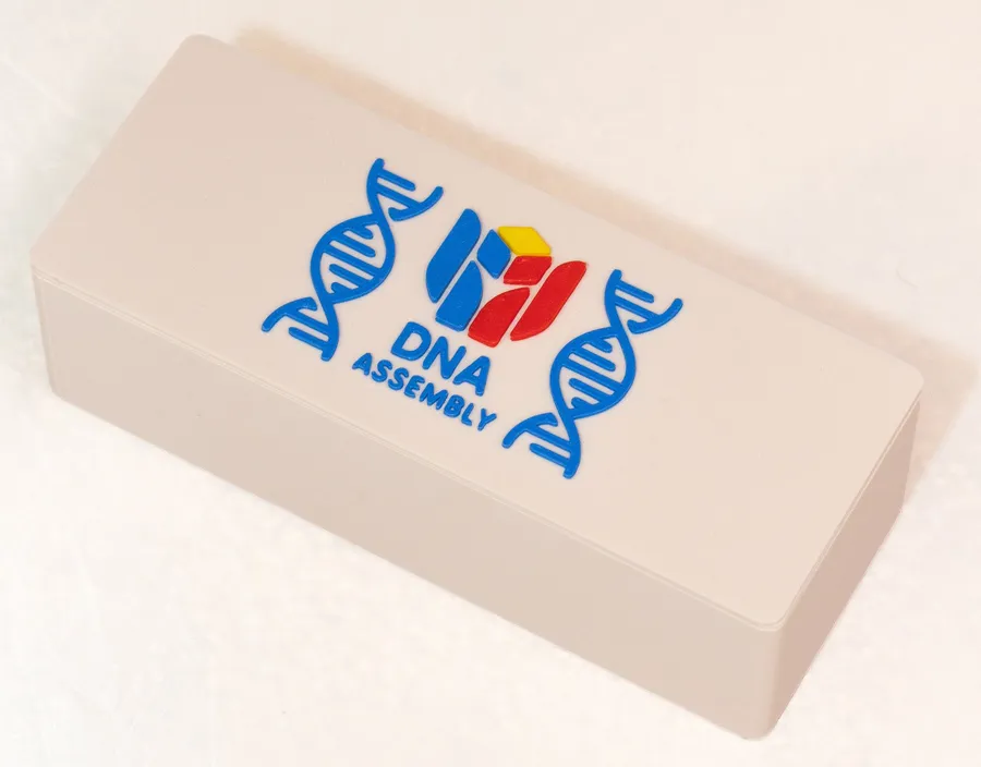 The long HANDS DNA Assembly kit box, closed, on a white surface